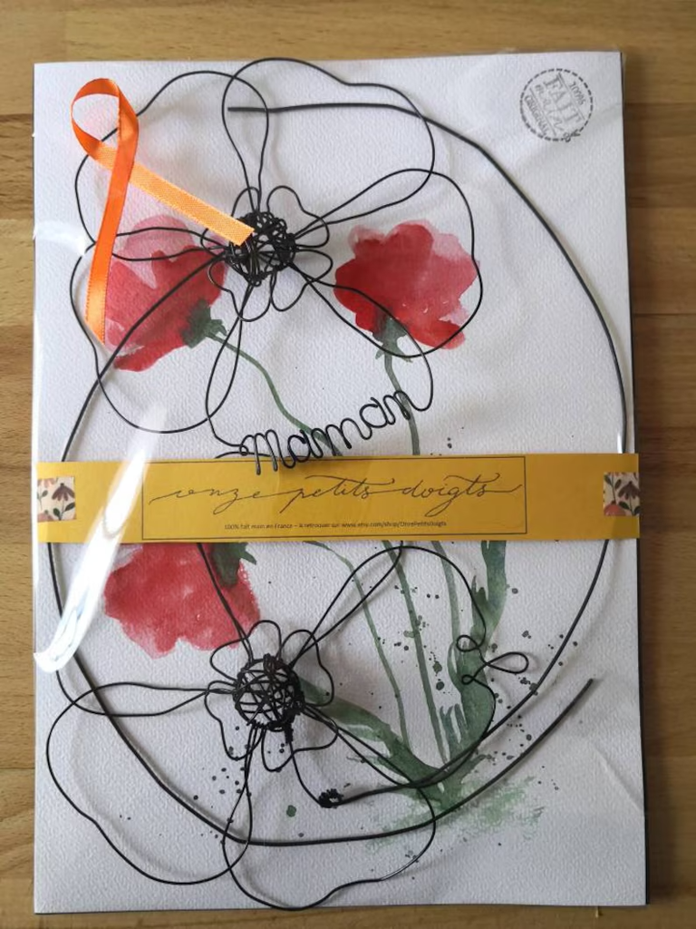 emballage soigné fleur prénom fil métal doré prêt à offrir