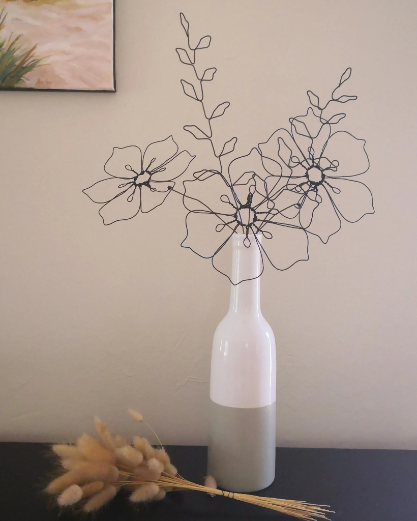 decoration en fil de fer poinsettias feuillages bouquet contemporain